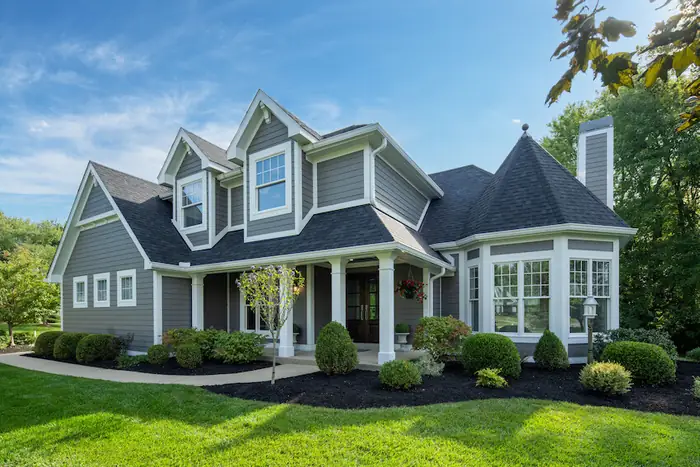 Warm Gray Lap Siding With Trim Details